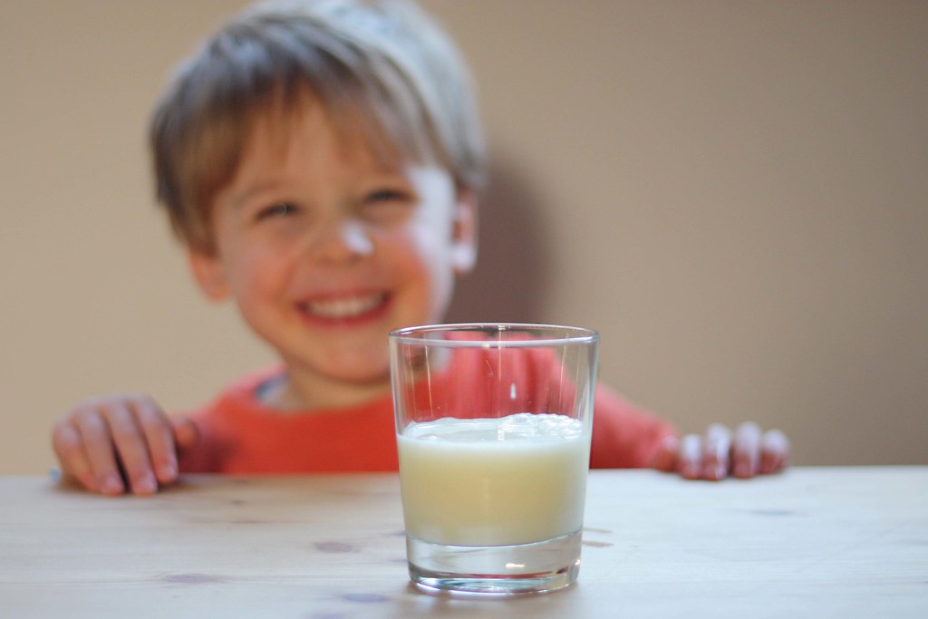 kid with milk