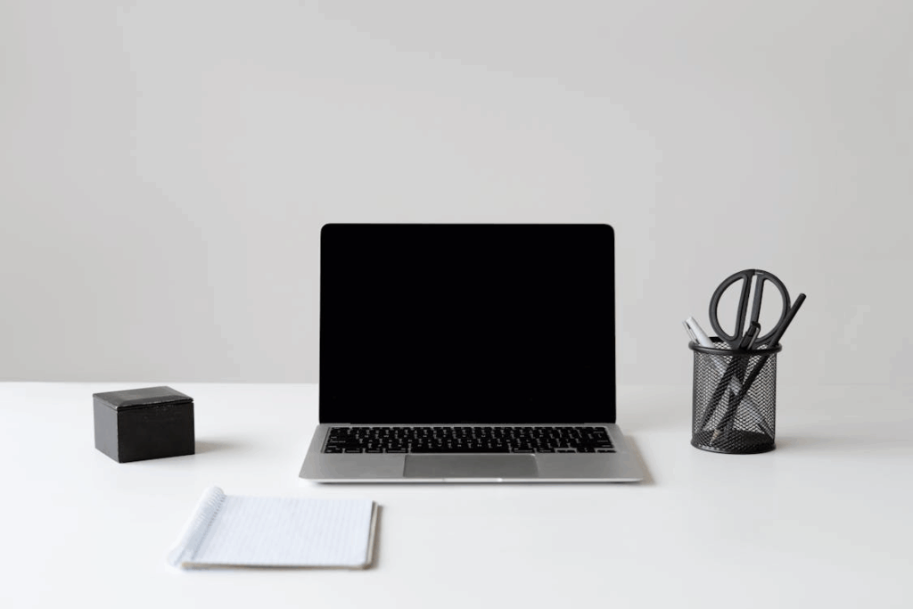 Clean minimalist desk setup to support procrastination hacks and deep focus.